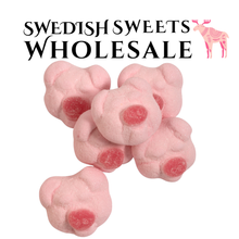 Pink candy shaped like animal figures with 'Swedish Sweets Wholesale' text above.
